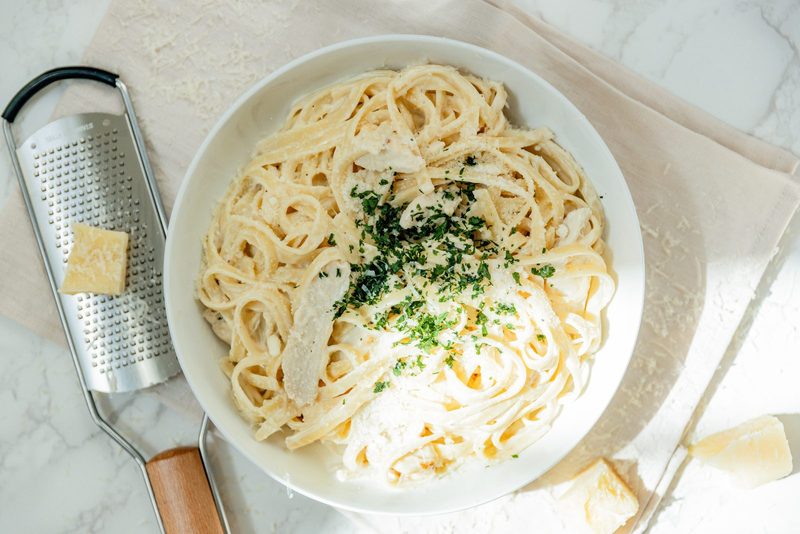 Fettuccine Alfredo with parsley and shaved parmesan at Pastaphony Fullerton