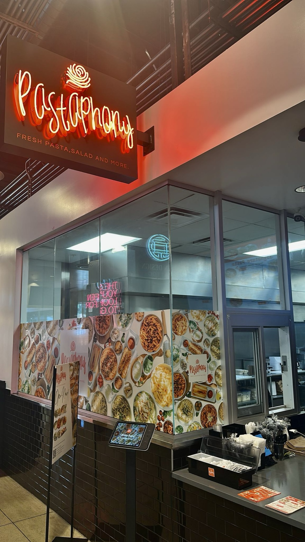 Pastaphony Stanton storefront with neon Pastaphony sign at Rodeo 39 Public Market